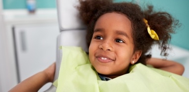 Smiling young girl at restorative dentistry appointment
