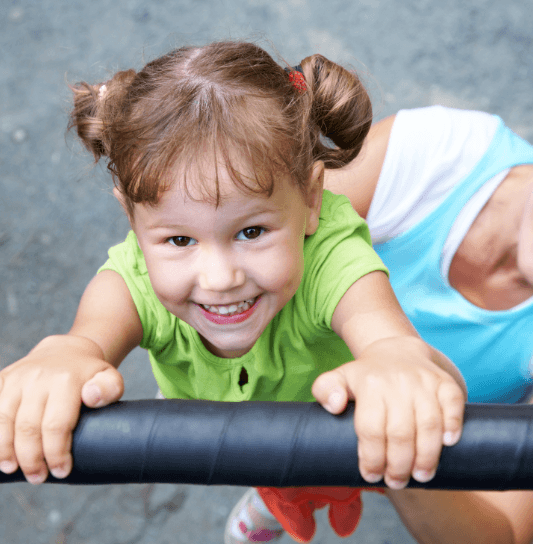 Little girl with healthy smile after emergency dentistry