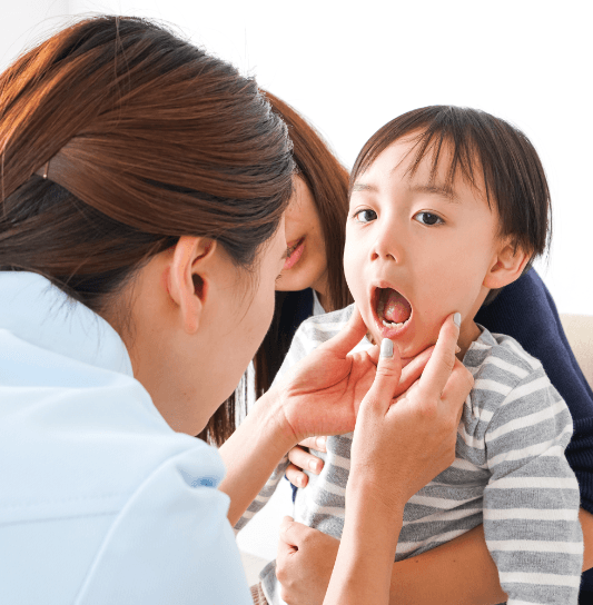 Child receiving emergency dental exam