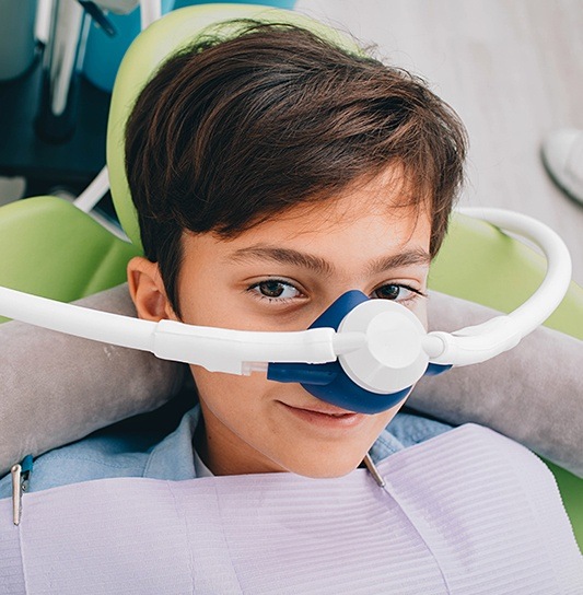 Young boy with nitrous oxide sedation mask