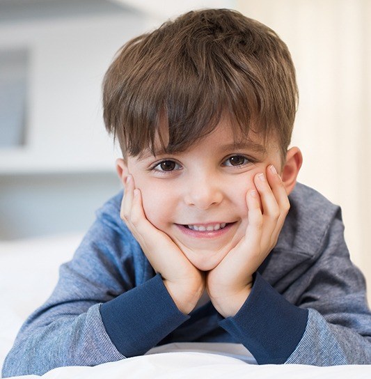 Young boy with healthy smile