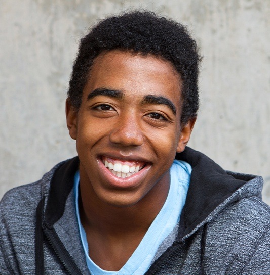 Teen boy with healthy smile