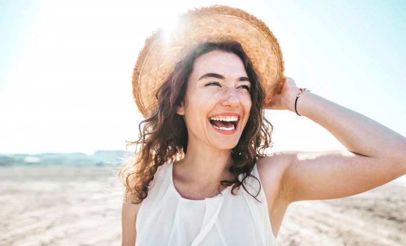 woman smiling on the beach